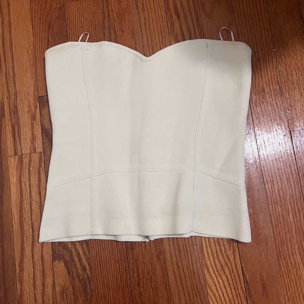 Very light yellow strapless corset size M.